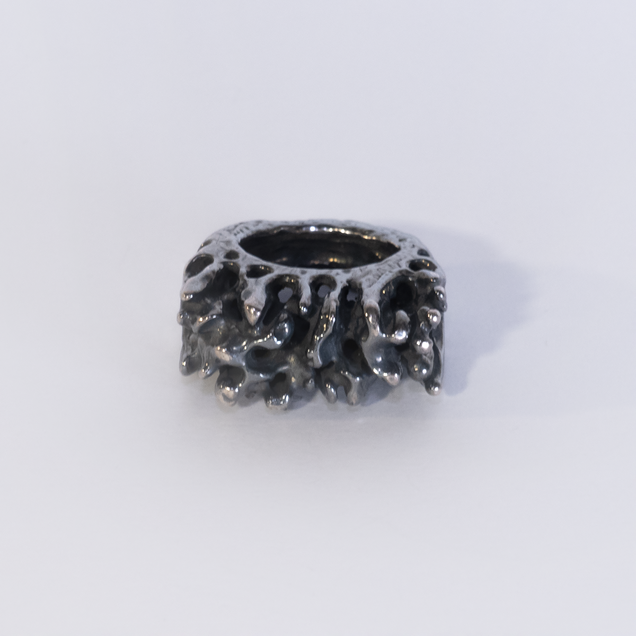 Silver ring with black finish that looks like coral reef