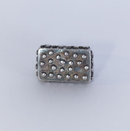 Black wide square silver ring with polished flat nubs surface