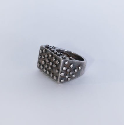 Black wide square silver ring with polished flat nubs surface