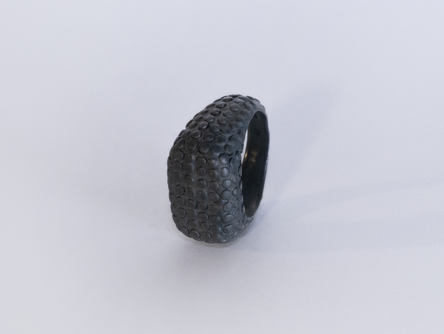 Black wide heavy silver ring with polished flat nubs surface